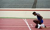 Carl Lewis Kneeling