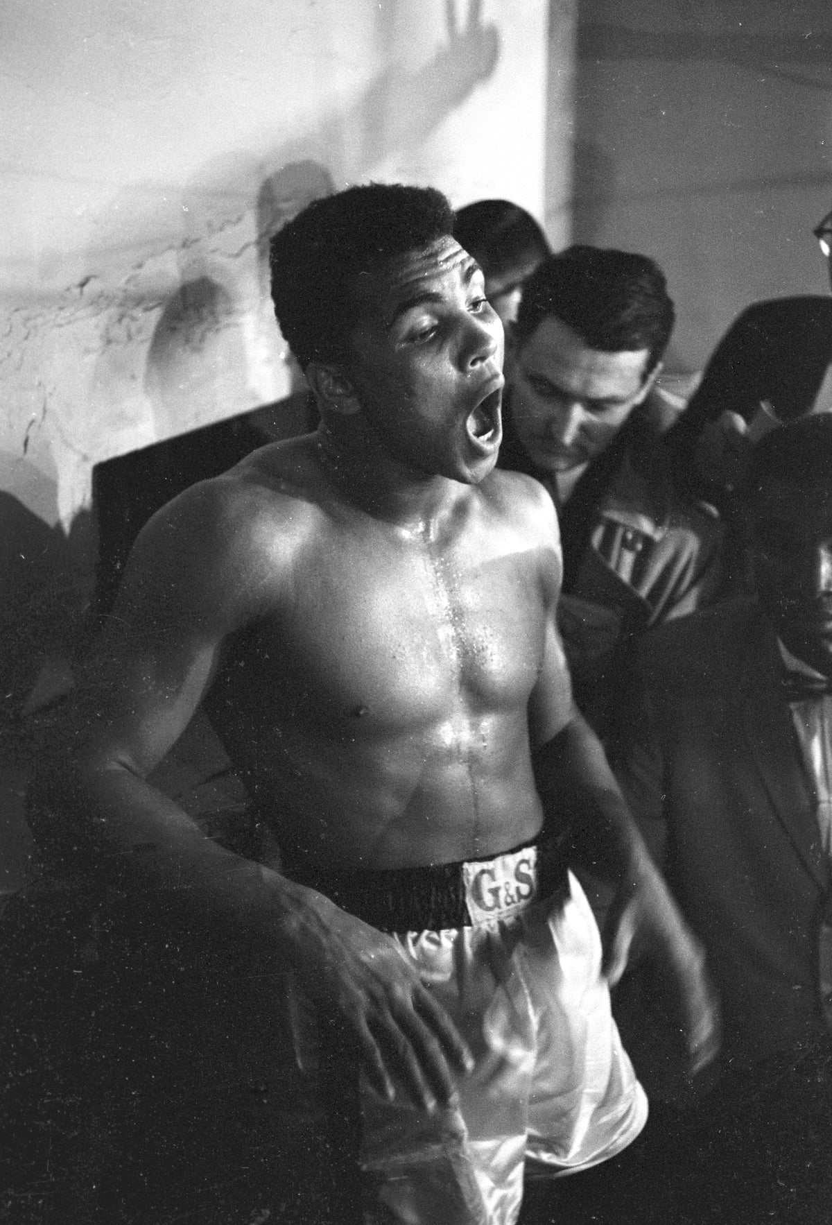 Clay vs Jones, Post-fight - Ali's Mouth Open, Hands Down