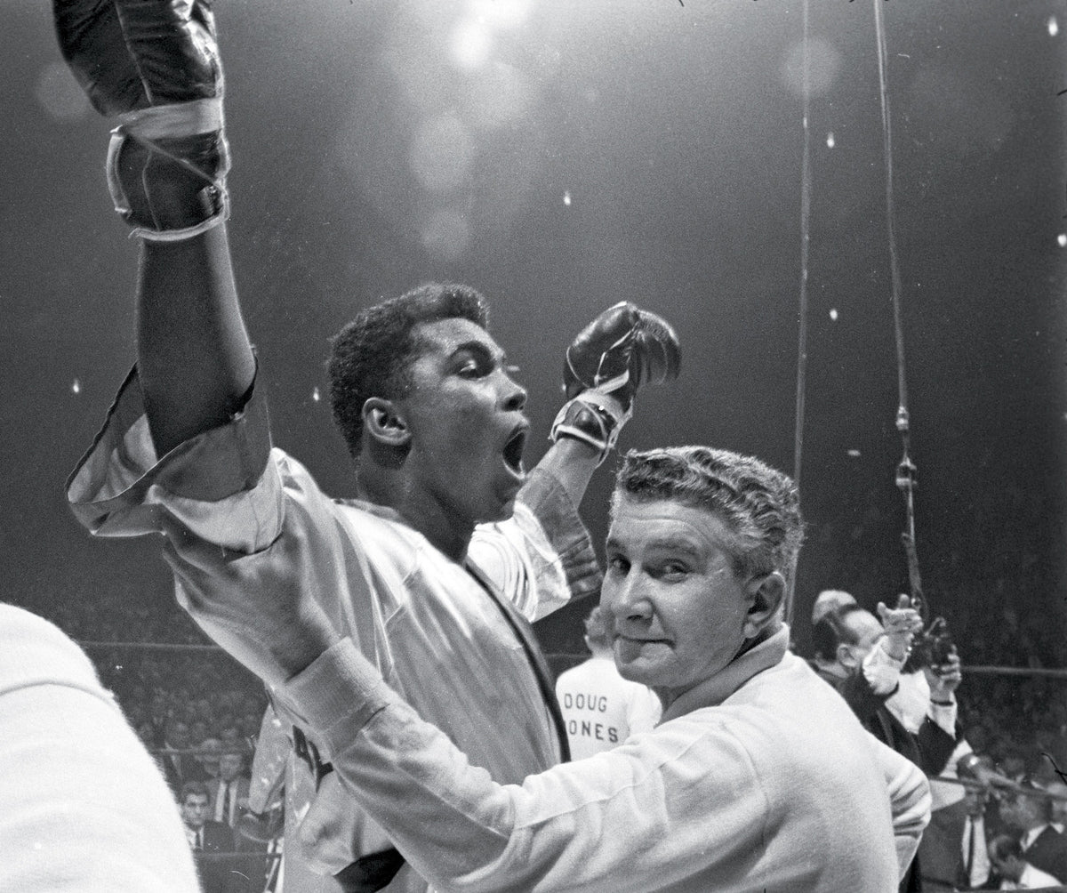 Clay vs Jones, Post-fight - Chickie Ferrara Holding Ali's Arm Up
