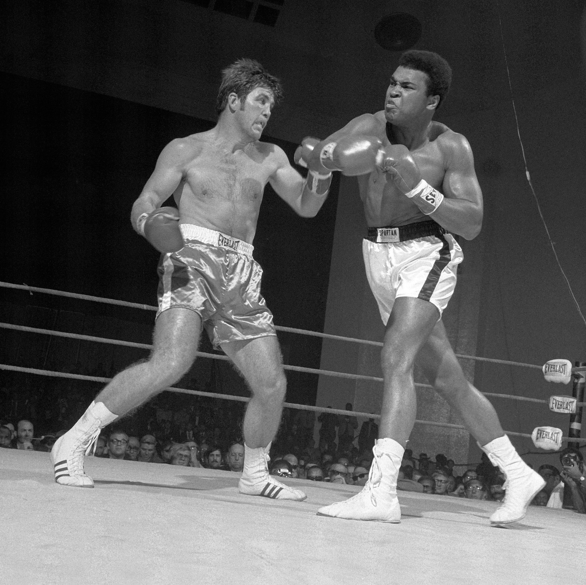 Ali Hand Rising Muhammad Ali vs Quarry, Ali Throwing a Right Hand | Neil Leifer Photography