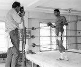 Muhammad Ali at Training Camp Posing for Photographer