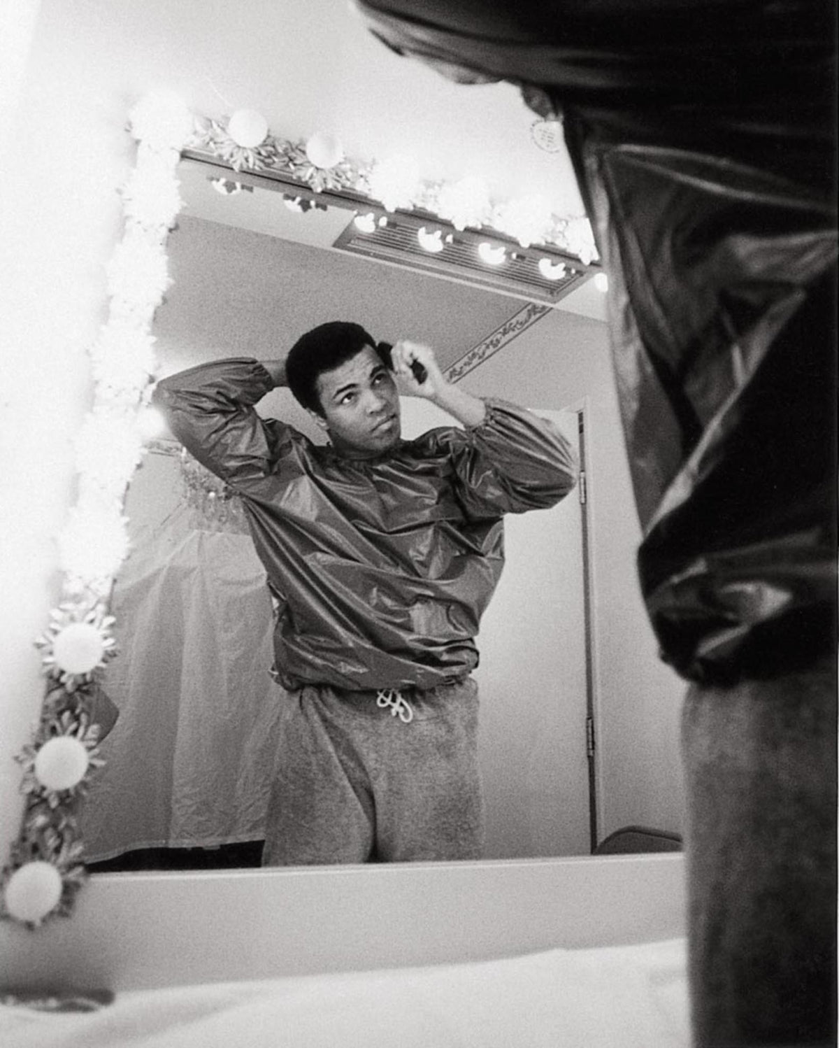 Muhammad Ali Combing Hair in the Mirror Before Bugner Fight