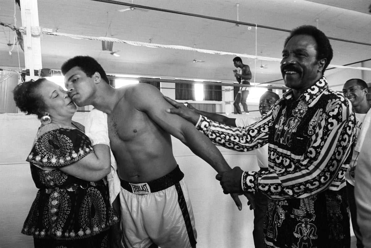Muhammad Ali with His Parents in Training Before Foreman Fight