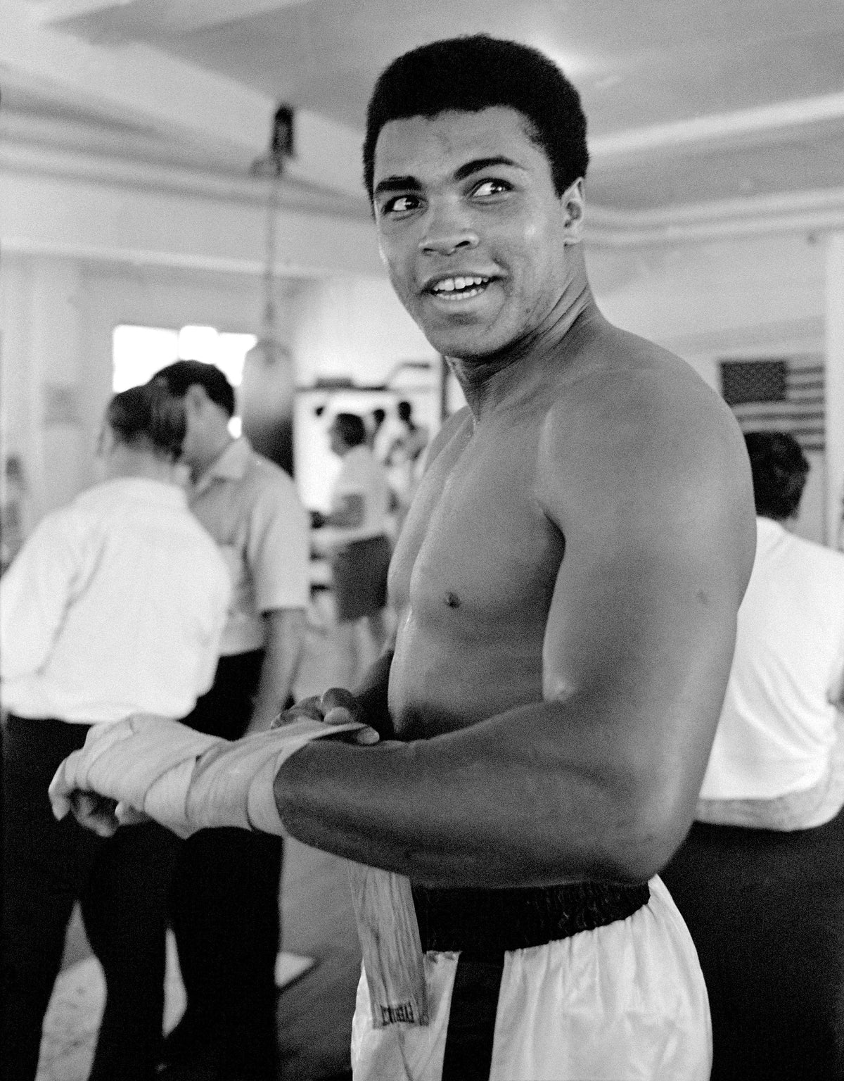 Muhammad Ali Training, Ali Taping His Hands at 5th Street Gym