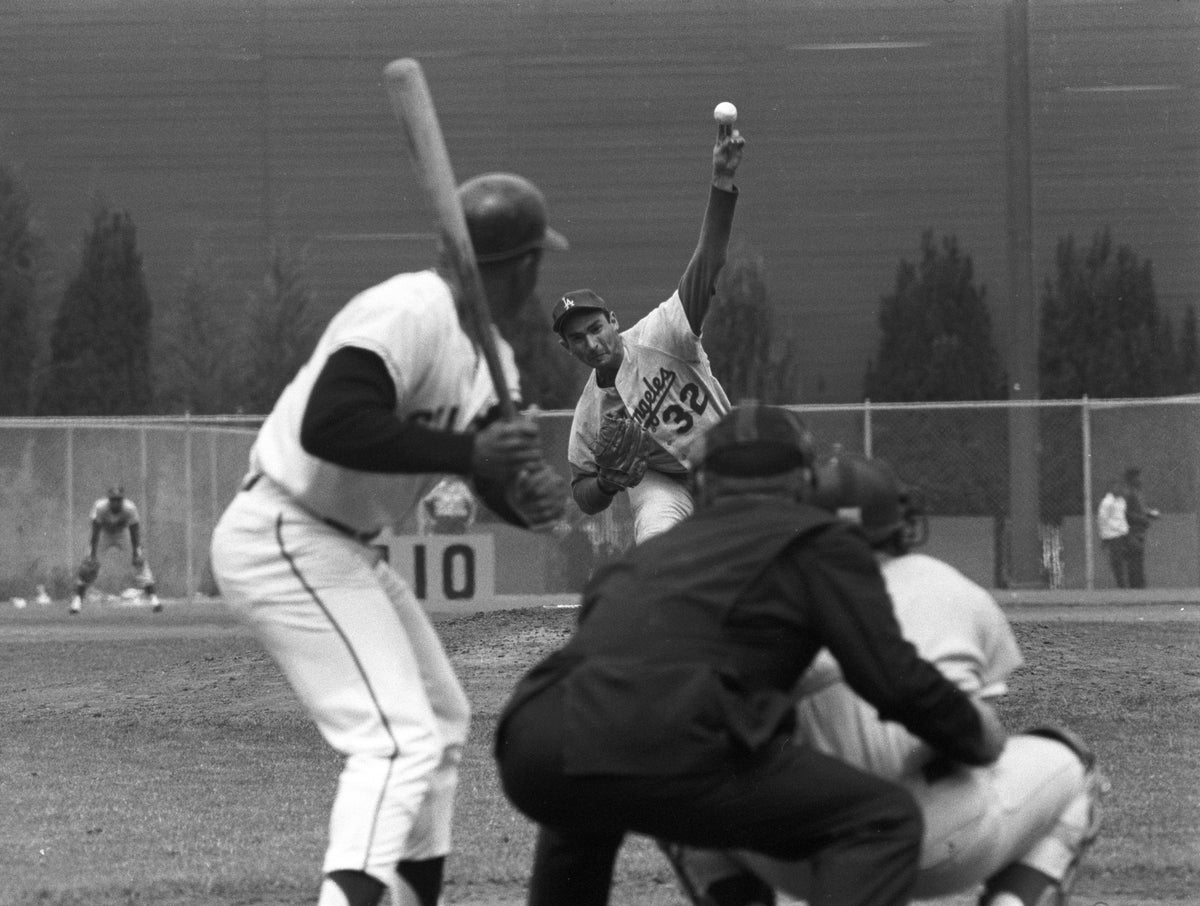 Sandy Koufax Pitching to Willie Mays