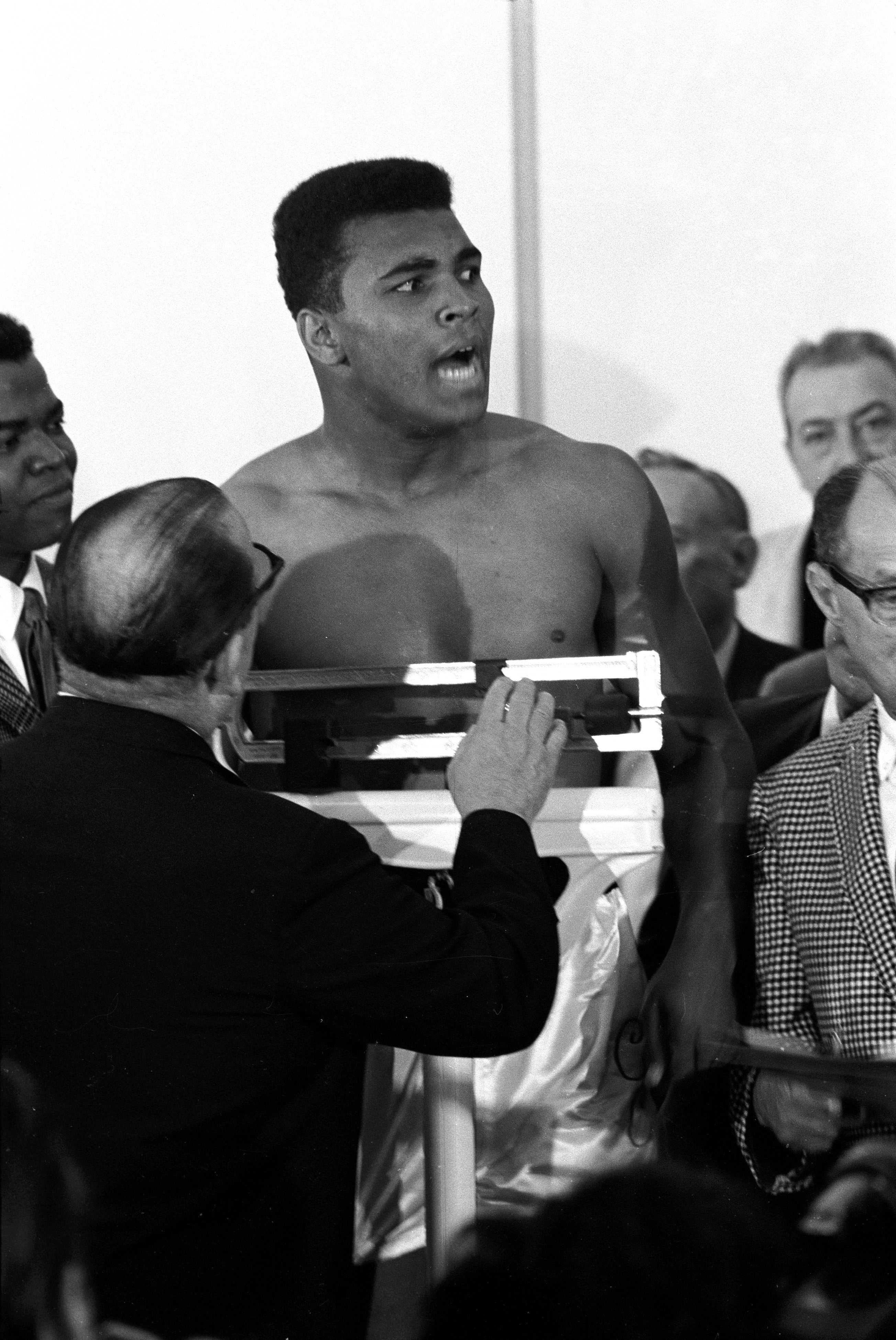 Muhammad Ali Scale Ali vs Liston I, Weigh-In, Ali on Scale (Vertical) | Neil Leifer ...